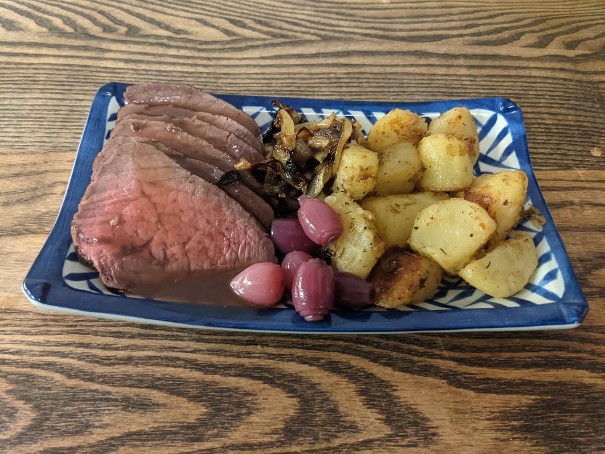 Roast beef with onions and potatoes