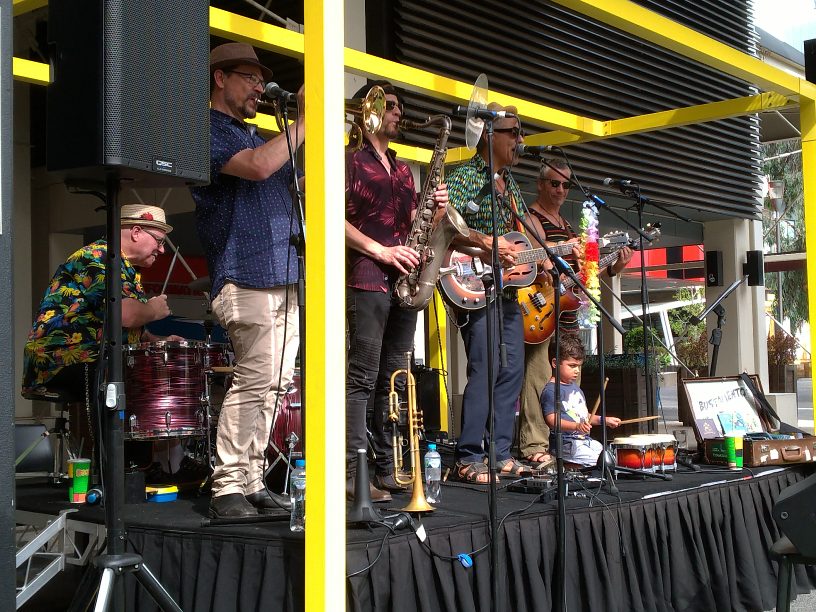 Great relaxing Sunday afternoon hearing @NickyBomba & Bustamento under the #MelbourneStar ferris wheel, great mix of ska and carribean tunes.  1st gig for a little bloke wandering around with sticks who sat at the drum kit in the break, then played bongos on the last tune....