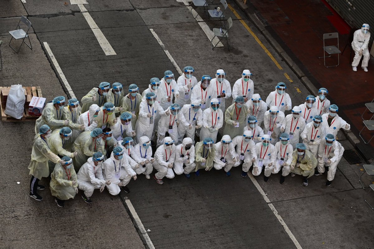 Staffers taking group photos