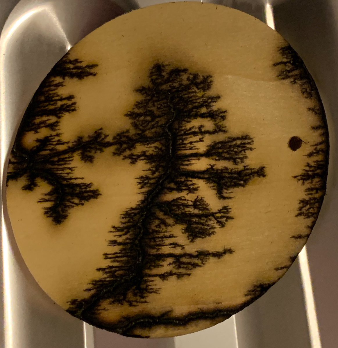 The1stRory's tweet image. Here is some more fractal burning I did. These are thick enough to resist heat, but small enough to use as coasters. I’m pretty happy with these. #fractalburning , #Lichtenberg #burning