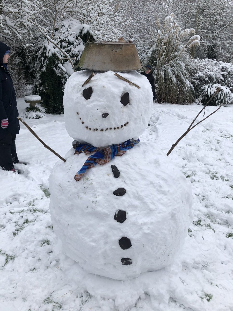 biffosmith14's tweet photo. Tim the Tin Hat Snowman ⛄️ is what you get when a software engineer &amp; a primary school teacher go out to play.

(Tim is socially distanced but outside @Lit_Smith’s bedroom window so she can see him) https://t.co/zIVaGTjTHO