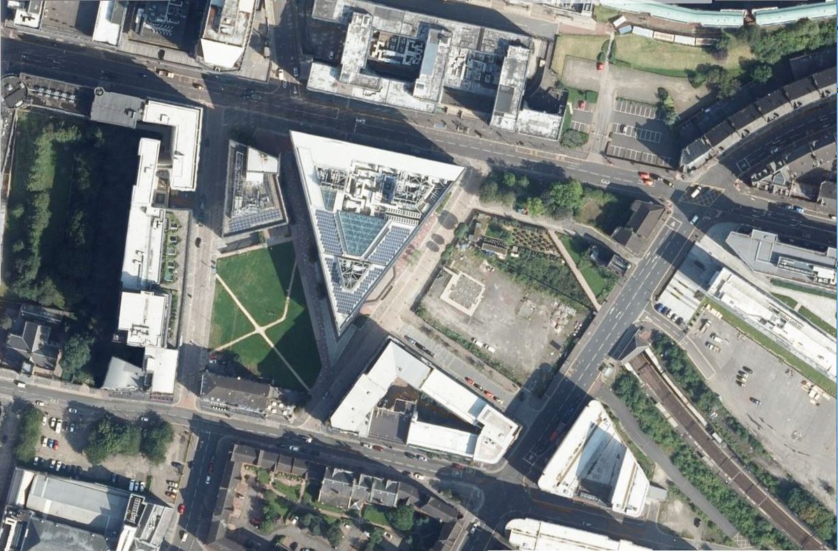 Seen from above, the TIC's main feature is its triangular planform, which has drawn parallels with other fantasy buildings.That planform is largely controlled by the acute angle between Shuttle St (to the east) and George St (to the north) which defines the site.