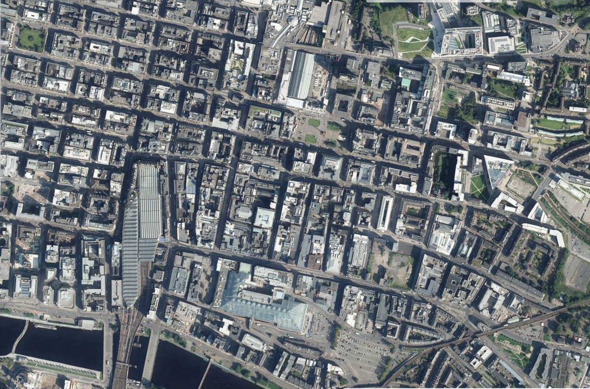 The line of George Street, in turn, defined the alignment of Glasgow's famous grid plan as the growing industrial city spread westward.Note the meandering course of Argyle St to the south, which reveals its age by the fact that it's still not quite true to the grid.