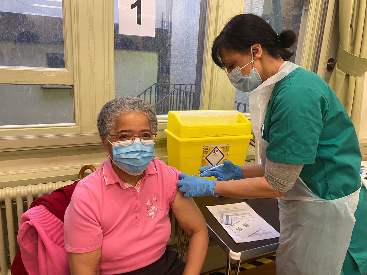 NHSEngland's tweet photo. ‘I was absolutely delighted when I got the text to come for my COVID vaccination jab — which I’ve now had, no problem whatsoever. I’m extremely grateful to the NHS.’

Dame @EAnionwu shares her delight at receiving the #COVIDVaccine today. 💙 💉 #ThankYouNHS

📸: @NHSEnglandLDN https://t.co/q9Zvz6A6Ff