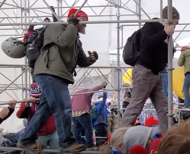 twfisher1's tweet photo. @rbc4l #elfnazi is following right behind #blackunderarmor guy here.  This is 34:25 in the INSURGANCE USA video. https://t.co/CtKCbRNULg