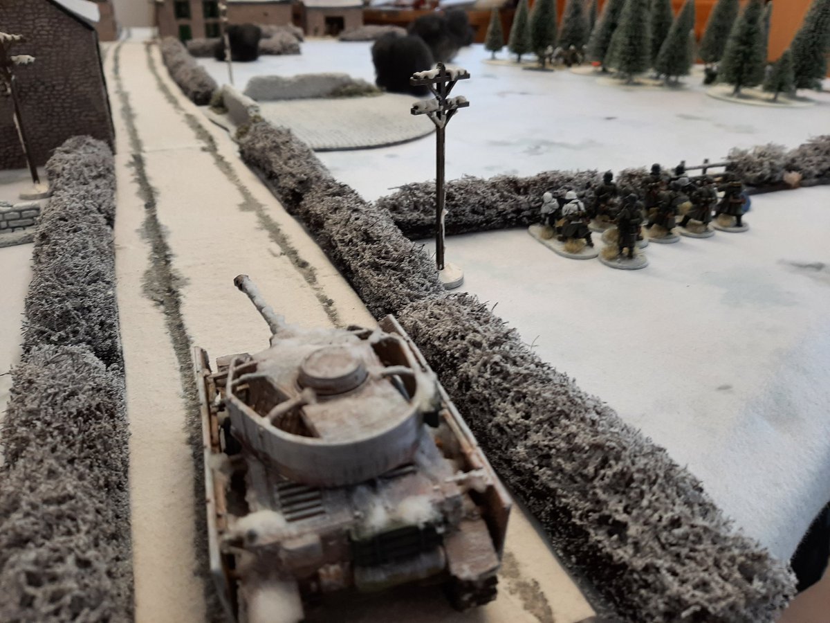 Pulling his troops back minus one squad that was pinned, the German cmdr tried to move up the left side of the table with the support of a Pz 4