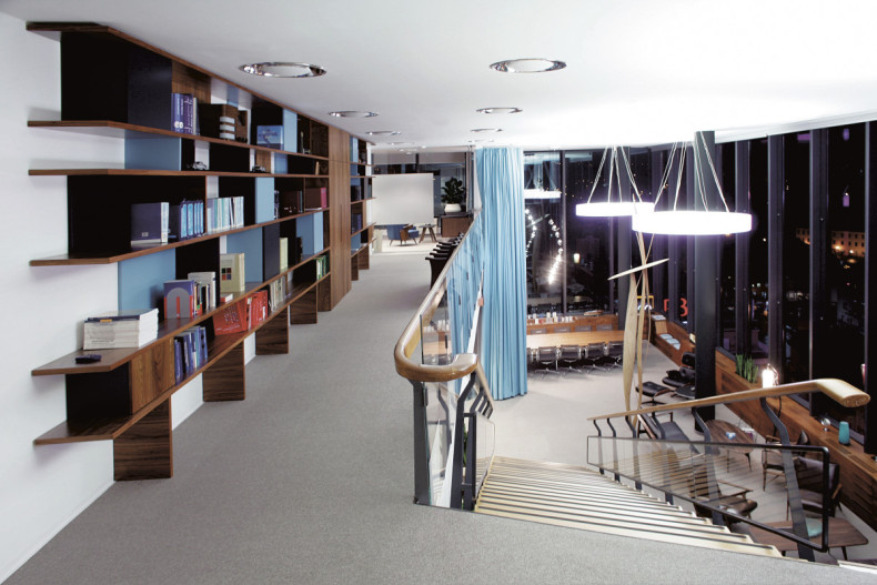 Firstly, the original facade of the building was replaced completely, an act which disfigured the building’s character. Also in this renovation, the famous penthouse Skyscraper Cafe was closed, it was turned into private office space.