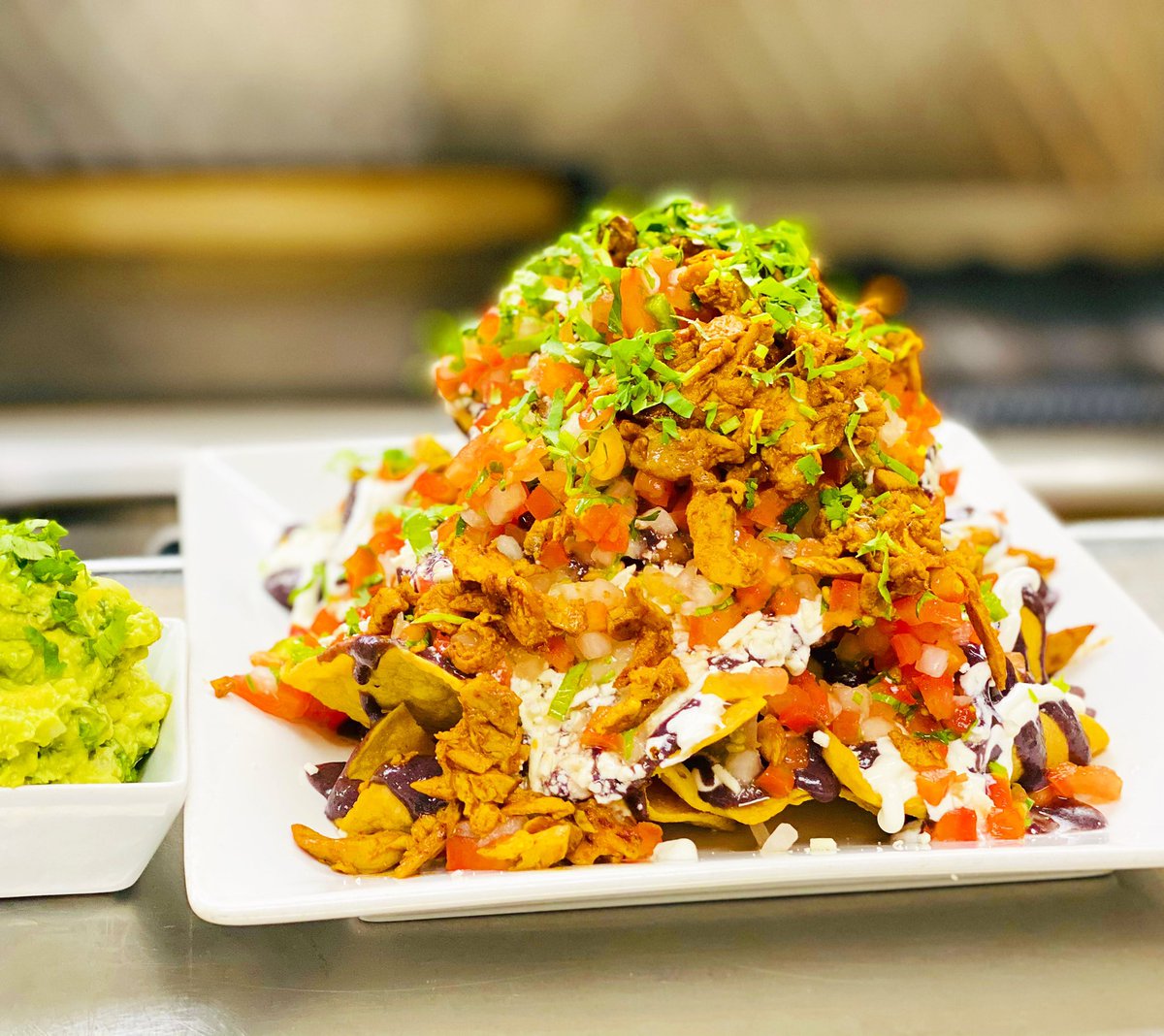 Nachos make everything better: even a wicked case of the Sunday blues! Add a side of our in-house made guacamole for extra delicious! #lapatronayeg #yegfood #shpkeats #shpkfood #sundayfunday