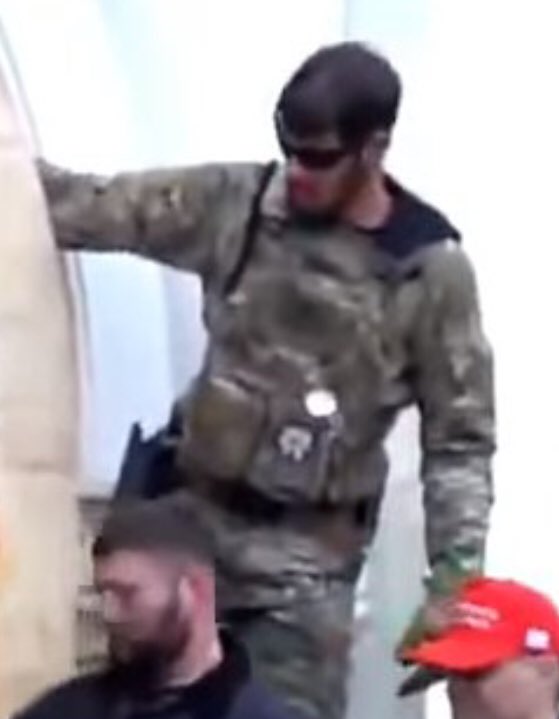 Based on patches & placement & lack of military vs airsoft gear, we can guess he is not current or former military.