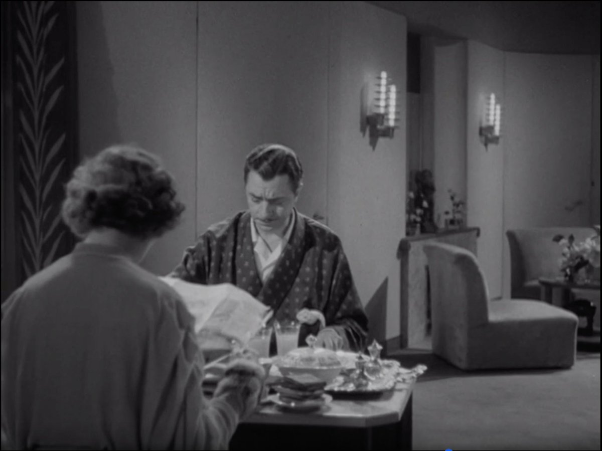 The breakfast nook of their bedroom suite which must be 40 feet wide. I mostly want to talk about these sconces. The sconce-game of the 1930s was so strong guys, prepare yourself for sconce love in every movie I post, haha.