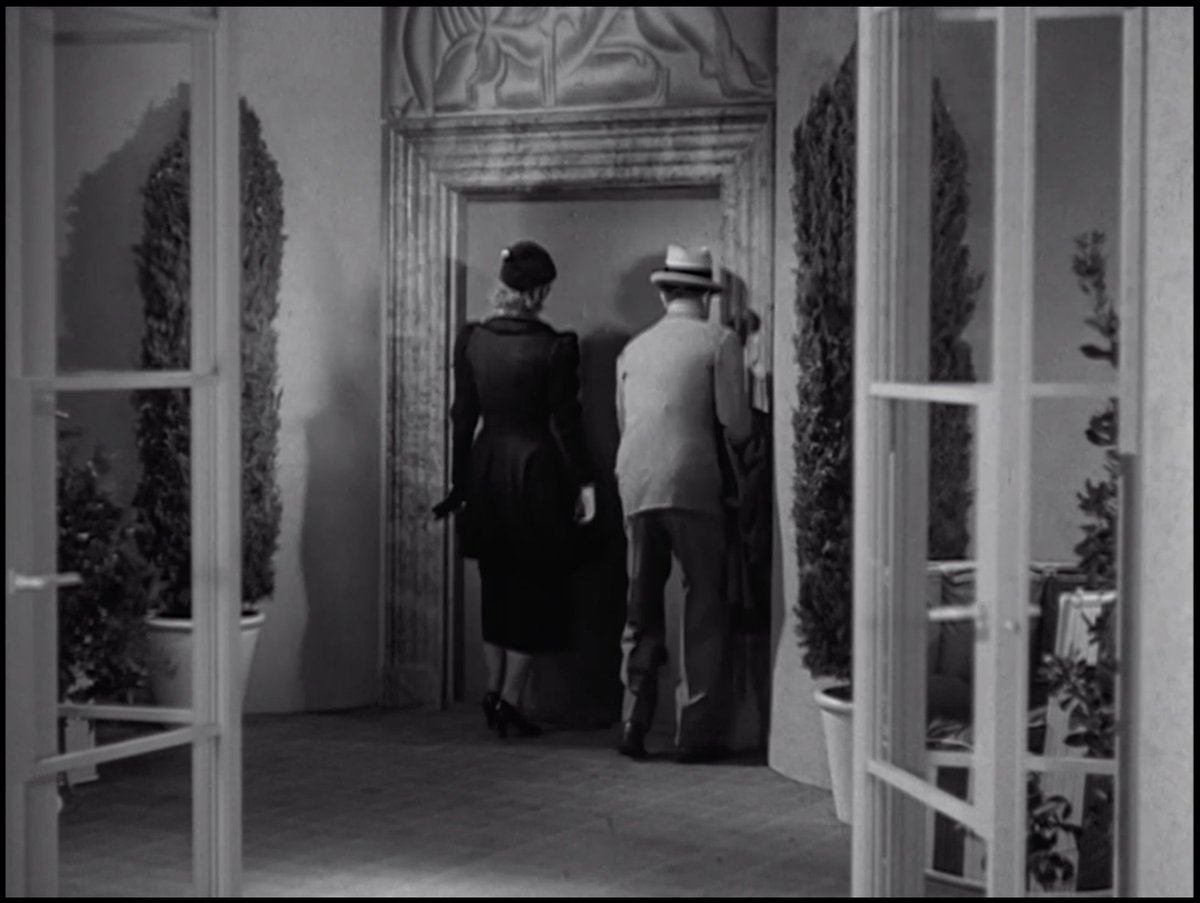 And the front door, with a hand painted mural above the marble door surround. So gorgeous. The set design is exactly like Nick and Nora: modern with a wink, so expensive looking but completely unstuffy. The kind of spaces you would drink a million highballs in.