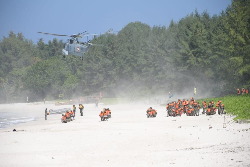 ANI's tweet photo. A large-scale conjoint military training exercise “KAVACH” along with “AMPHEX-21” conducted in Andaman Sea &amp; Bay of Bengal, under aegis of Andaman &amp; Nicobar Command with participation of Eastern Naval Command &amp; Army Southern Command involving Army, Navy, Air Force &amp; Coast Guard. https://t.co/r0sVQceHr0