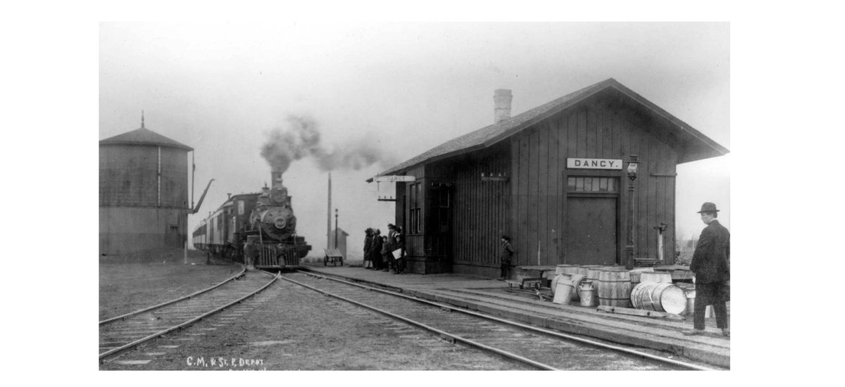 Halfway between Stevens Point and Wausau, Dancy (a tiny town on the south side of Lake Du Bay) was an up-and-coming lumber town named Hutchinson in the late 1800s with a lumber mill, planing mill, and a depot on the Chicago Northwestern railroad. 1/11