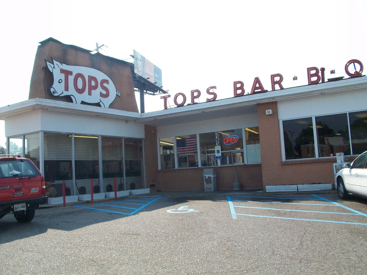 Tops is probably the most well known BBQ spot in the city. They have their own sauce that people either hate or love. Aint no in between. I suggest getting sauce on the side. You can also ask for all white meat too. The burgers though? That's what most people will tell you about.