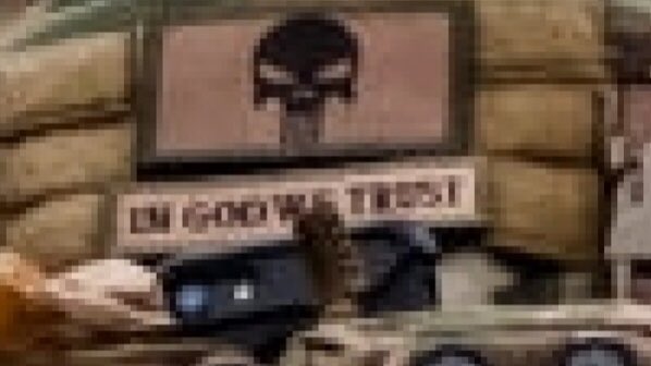  #Magnolia ‘s patch with lettering is now clear. It says “in God we trust”. Can anyone identify anything else?