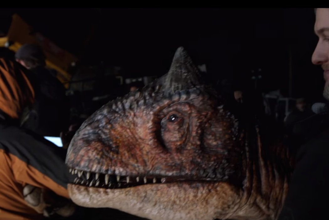 [18/19] A male orange Carnotaurus was originally supposed to appear in the Mainland sequences of the film, it's unclear exactly what it would do, the only remains of Carno on the mainland are Demon, the black and red Carno that eats Mills alongside Rexy