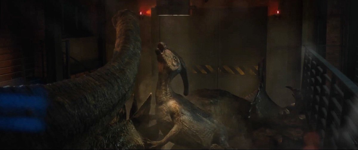 [16/19] During the end of the film in the Manor's halls, an extended cut had Parasaurolophus and Apatosaurus interacting with each other, it's unclear how long this scene originally lasted as we only have this frame and the shorter version on the final film