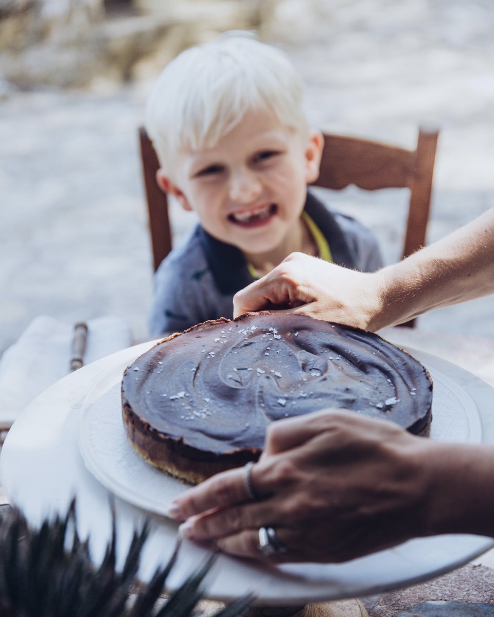 My Salted Caramel cake. refined sugar-free &amp; plant-based. It’s a huge crowd pleaser &amp; an instant pick me up. From The mymuybueno Cookbook. 
​
A macadamia &amp; buckwheat base, gooey caramel centre and rich chocolate top and sea salt.

​#mymuybueno #mymuybuenocookbook #eatlivelearn