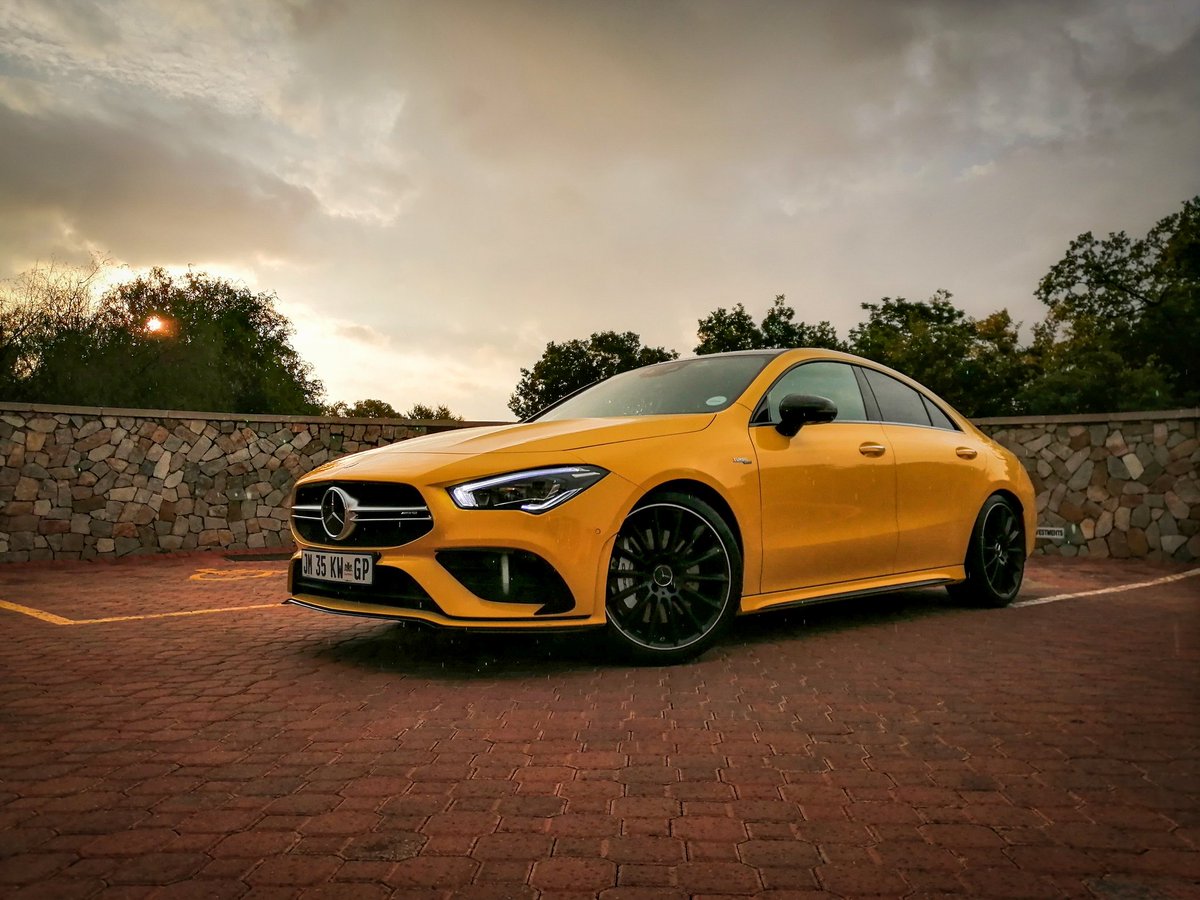 Roger_TCR's tweet photo. This week's Garage Guest is one very fast banana - the @MercedesBenz_SA CLA35. What a  difference a generation has made to the CLA. Who would've thought there'd be a day when a slice of custard is a better driver's car than a BMW? Compared to the BMW M235i GC, this is remarkable. https://t.co/TqIIQt4Khi