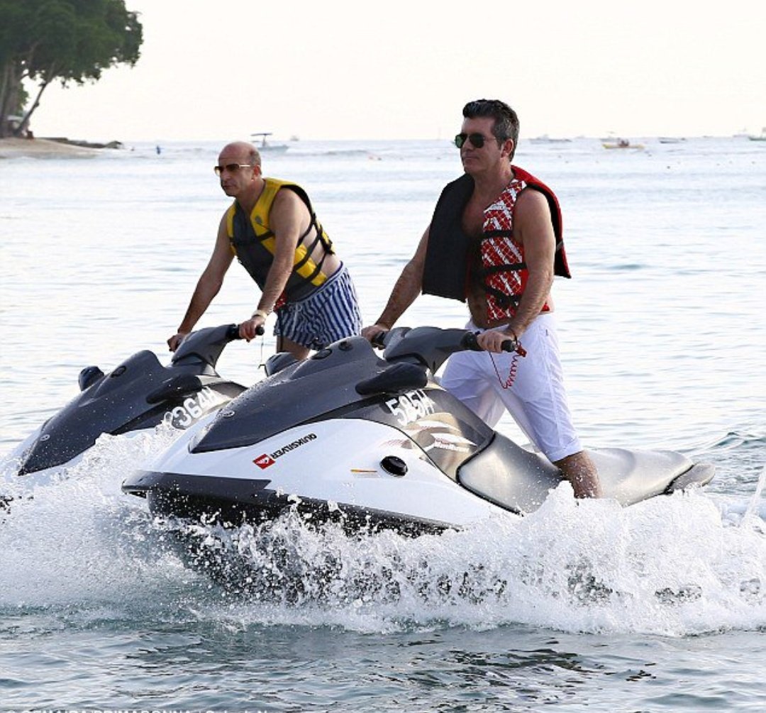 Simon has been rumoured to have a lot of "fake" pr girlfriends. There are also rumours about gay lovers (for example Paul Mckenna, his best-friend, who also has an odd set-up. He was engaged for several years to his manager and now shares a house with with her platonically)