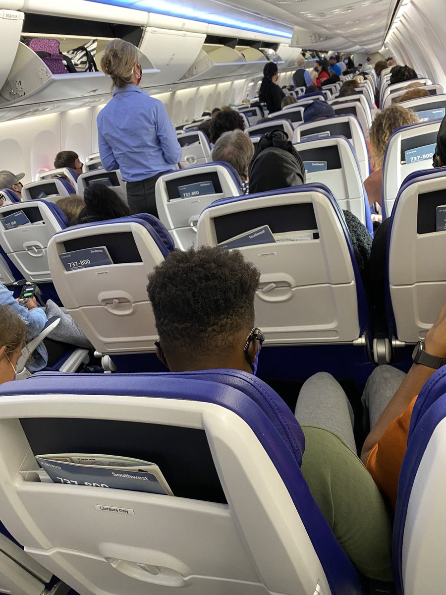 TyeDavis216's tweet photo. @SouthwestAir this is their definition of social distancing. A full plane #flight1608 https://t.co/Hg0q1F26o1