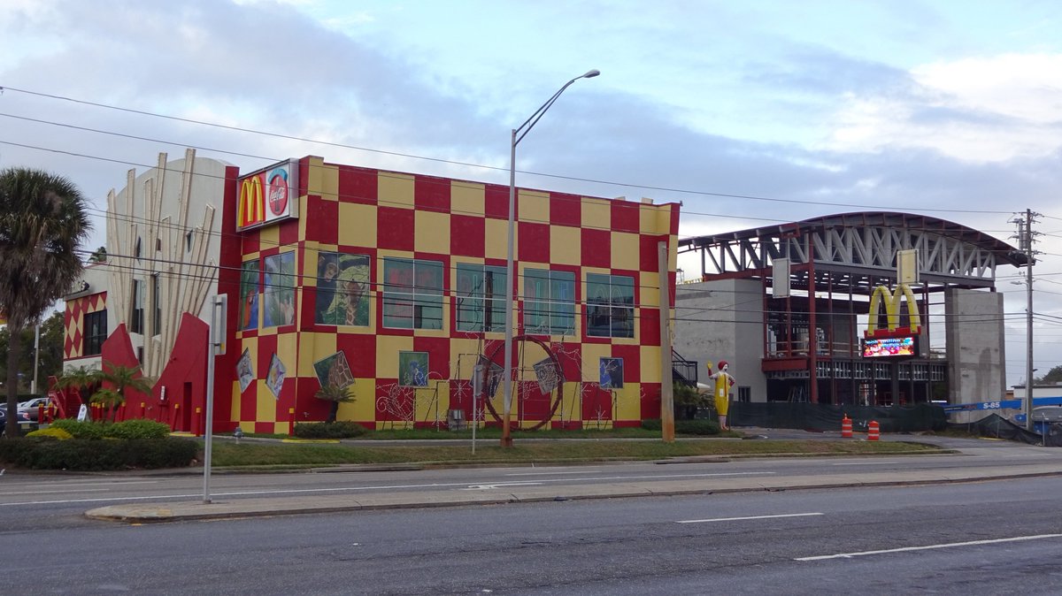 in 2015, a structure began to rise alongside the original location, being built to house its replacement. it wouldn't be until 2016 until the new mcdonald's finally opened; in its final days, the grand neon fries of the old location went dark.(photo credit:  @bioreconstruct)
