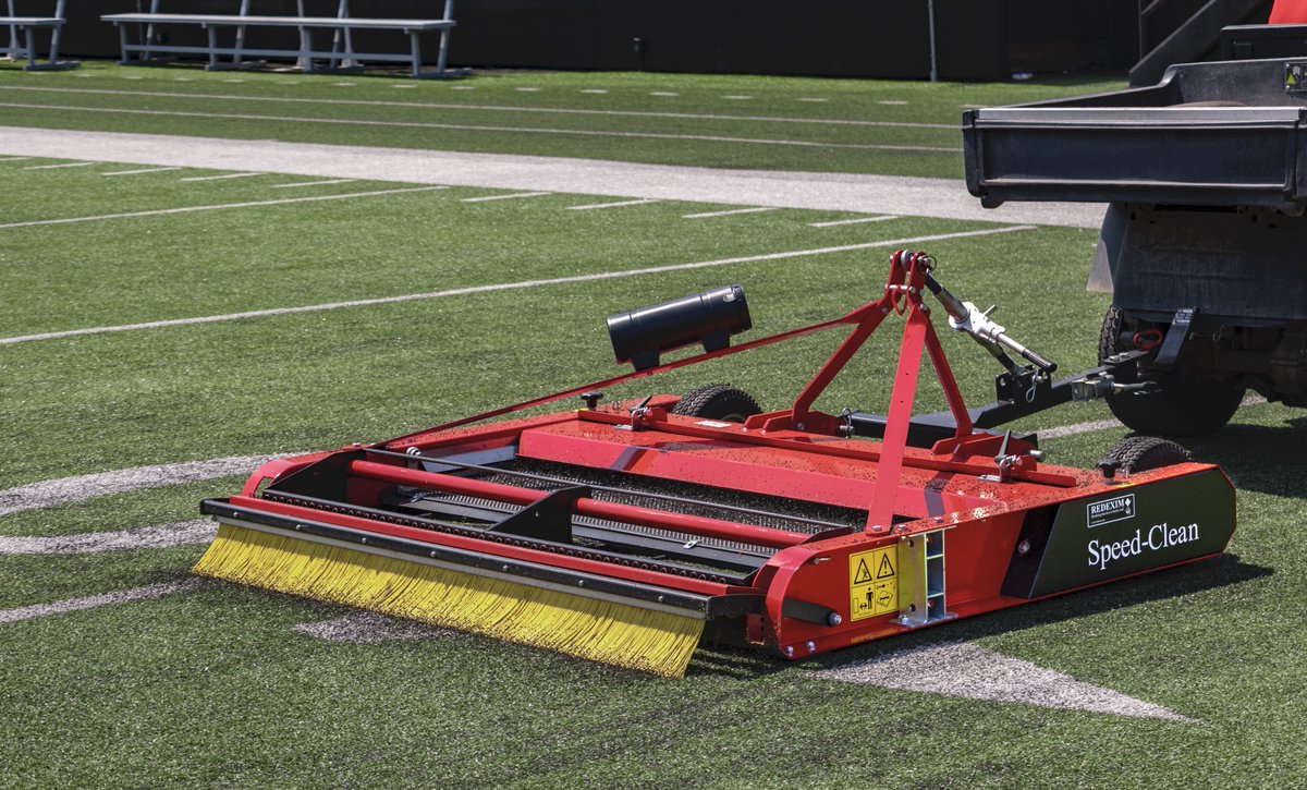 Redexim's tweet photo. With 2 large debris collection bins that easily lift straight up and out, the Redexim Speed-Clean is by far the easiest Land-Driven turf sweeper to clean out and operate, saving you time and headache. #Redexim #SpeedClean https://t.co/FS9nSvy1a6