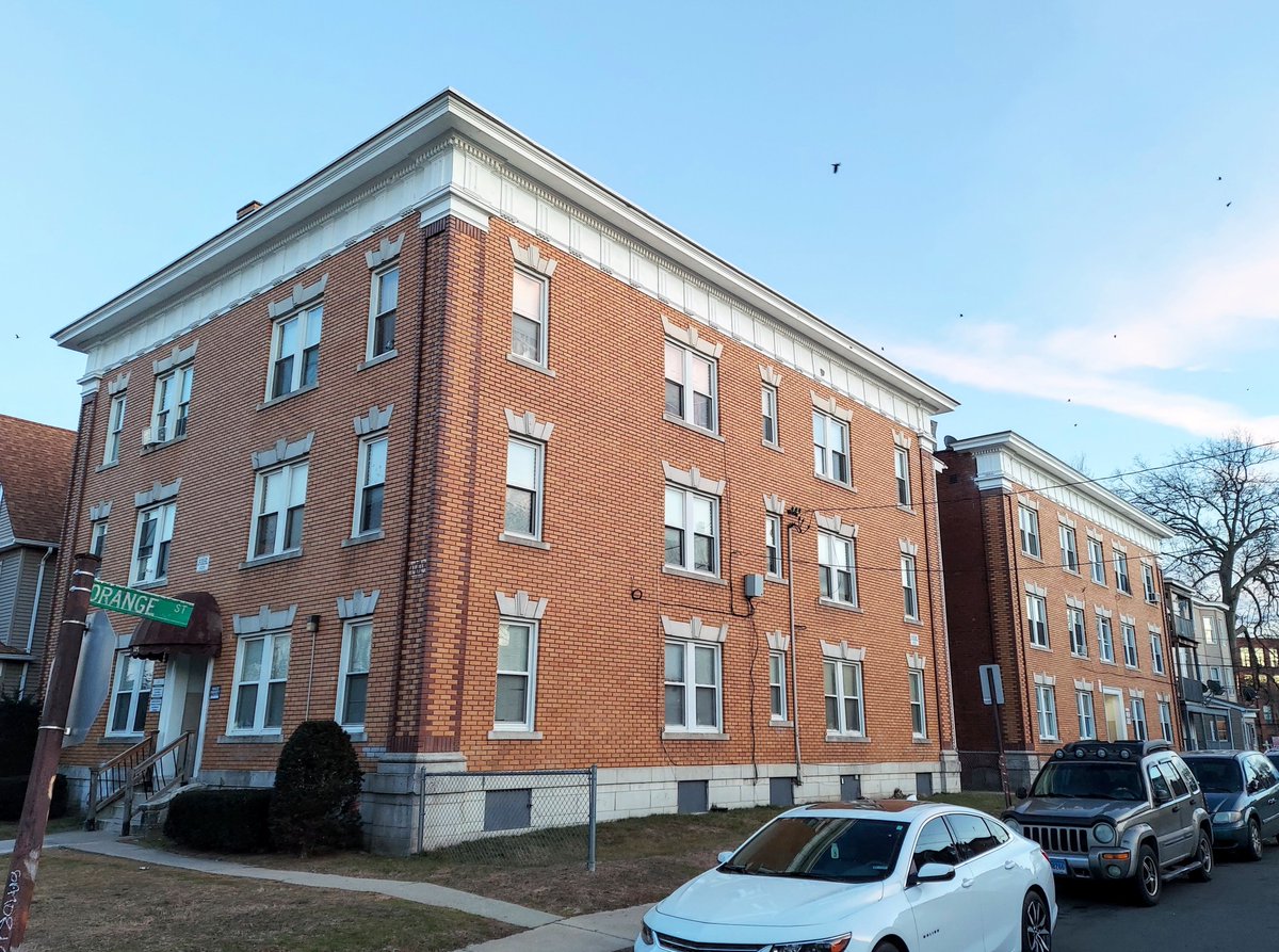 Parkville has a number of larger apartment structures. (Yes the parking in the front yard made me want to puke. Paved front yards are a huge issue in Hartford.)