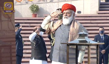 ANI's tweet photo. Prime Minister Modi is wearing a special 'Paghdi' from Jamnagar, today. The first such 'Paghdi' was gifted to the PM by the royal family of Jamnagar, Gujarat. https://t.co/7wRITqsC52