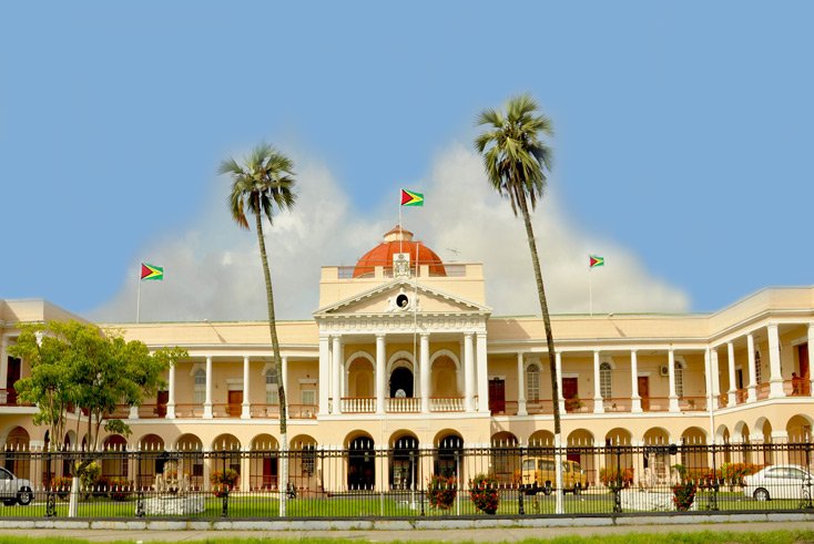This evening we're headed to the Parliament Building in Georgetown, Guyana. The building was started in 1829 and was completed in 1843. It's an example of Renaissance architecture and is one of only two domed buildings in Georgetown. The statue below is of......