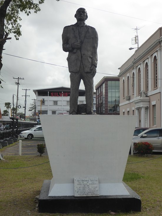 This evening we're headed to the Parliament Building in Georgetown, Guyana. The building was started in 1829 and was completed in 1843. It's an example of Renaissance architecture and is one of only two domed buildings in Georgetown. The statue below is of......