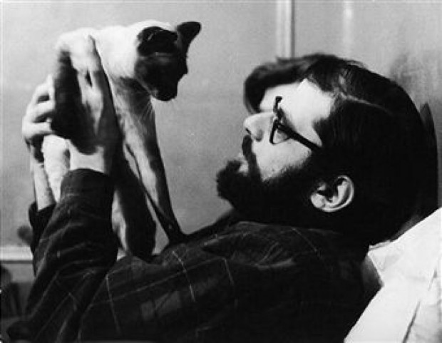 22/ Allen Ginsburg and cat