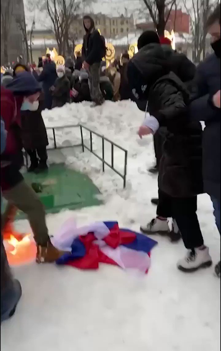 ScottsHumor's tweet photo. @StashPrada Friends, there is nothing happening in Russia. A few thousand agent-provocateurs and "tourists" are staging "protests" by burning Russian flags, disregarding state symbols of Russia and injuring Russian men.  
All this hype is a virtual mystification by bots and media. https://t.co/V6wdKonTmA