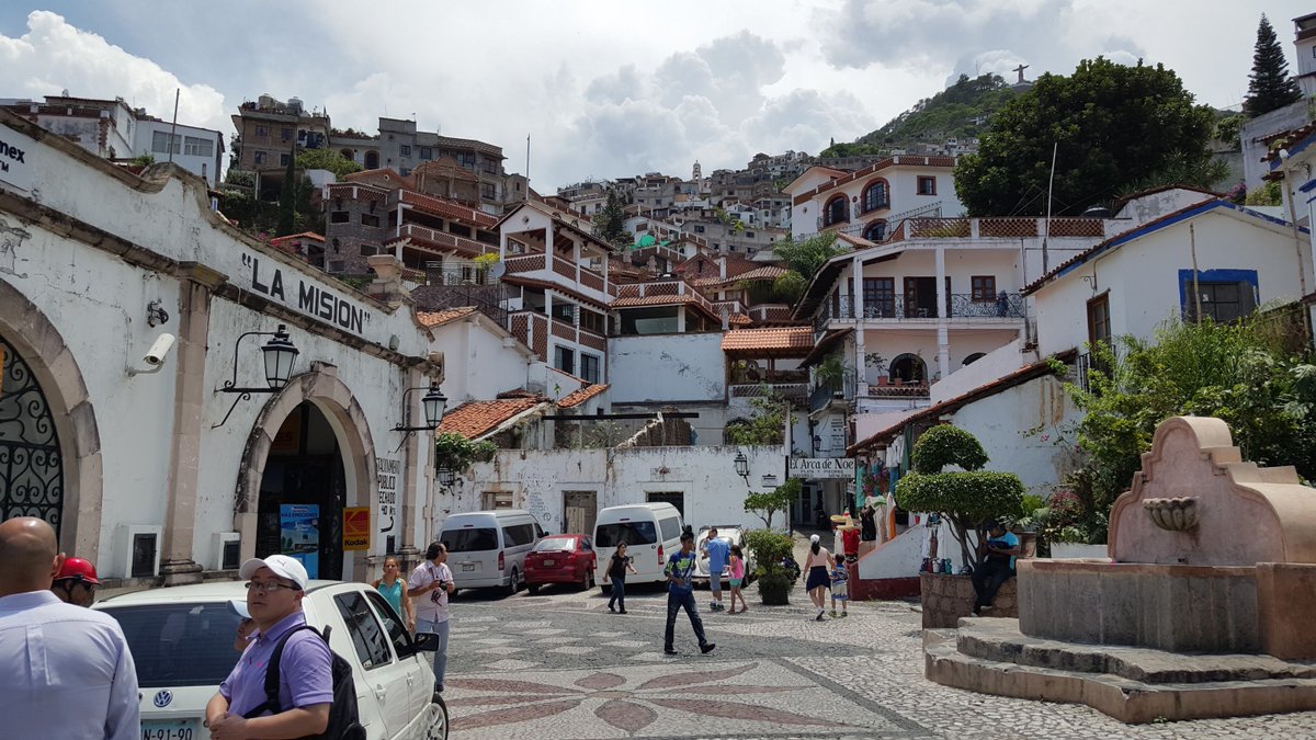 I would consider all of these charming places (fictional and real) because they are a composition of human scaled elements: stair cases, doors, balconies, no long blank walls, paths that are not too wide, places to sit and talk and watch.Place yourself anywhere and you belong.