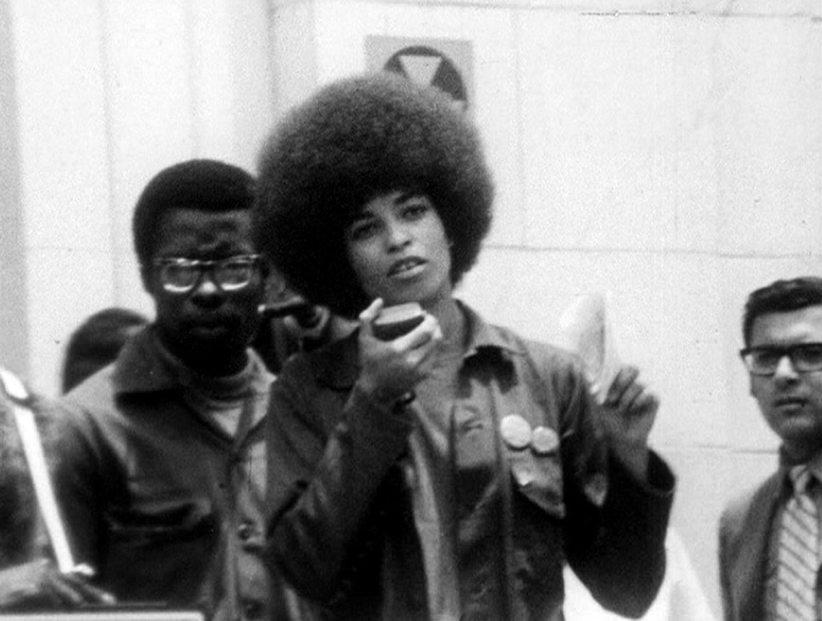 sunujournal's tweet photo. Happy Birthday to political activist, author + professor, Dr. Angela Davis, born on this day in 1944. Stills of Davis from the 1971 documentary Angela Davis: Portrait d’une révolutionnaire (1971), dir. Yolande Du Luart. #SUNUnotes #SUNUjournal https://t.co/wmgiqtE9Zu