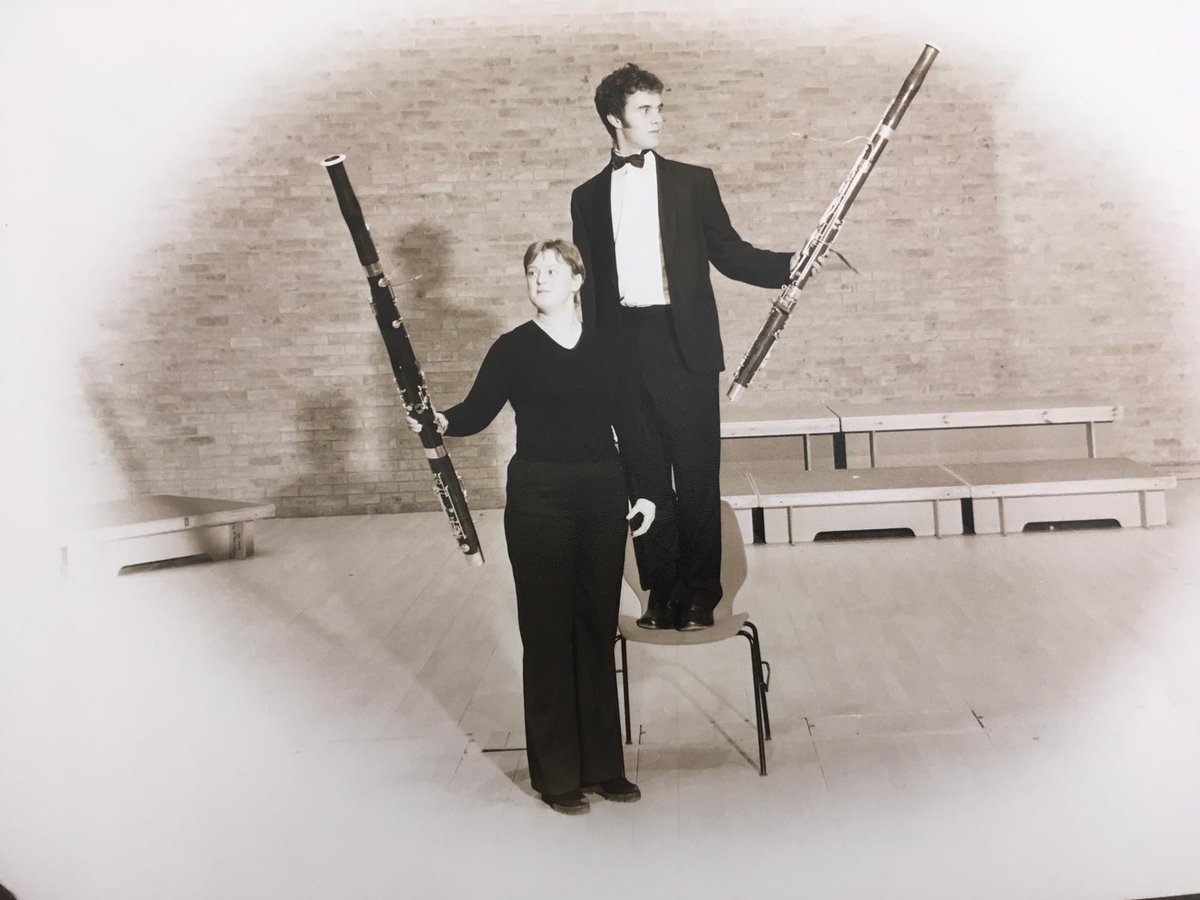 kingsmathschool's tweet photo. #Quote "Music holds the mirror to our emotions" - said Mr. Collins, our Deputy Head, in #virtual assembly. He highlighted stories + #maths behind Bach's magical music + played beauty excerpts throughout. #Throwback pics: Mr. Collins with the bassoon. Also plays piano + guitar🎹🎸 https://t.co/T5Zg3vJy7m