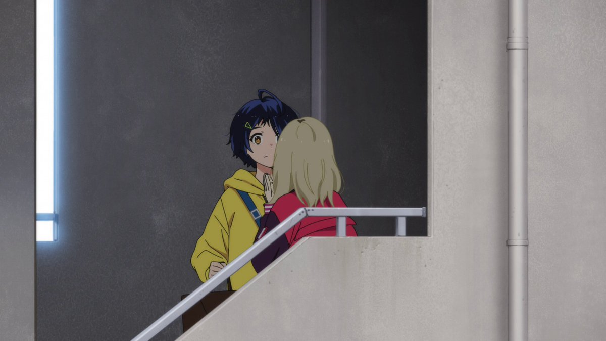 Her selfish front that she initially puts on is reflected more in the cinematography. There's a nice division created by the wall leading to Ai's home before Rika enters that space. This even extends into the hospital visit where Rika is framed next to Ai within the door frame.