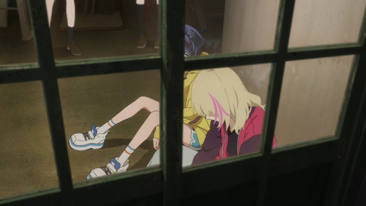 Ooo! A shot angled down on Rika through a window? Amazing! Since we're looking down on her, this is an indication that Rika looks down on herself. She's boxed within one of the window panels too, this feeling of self-hatred is suffocating to her.