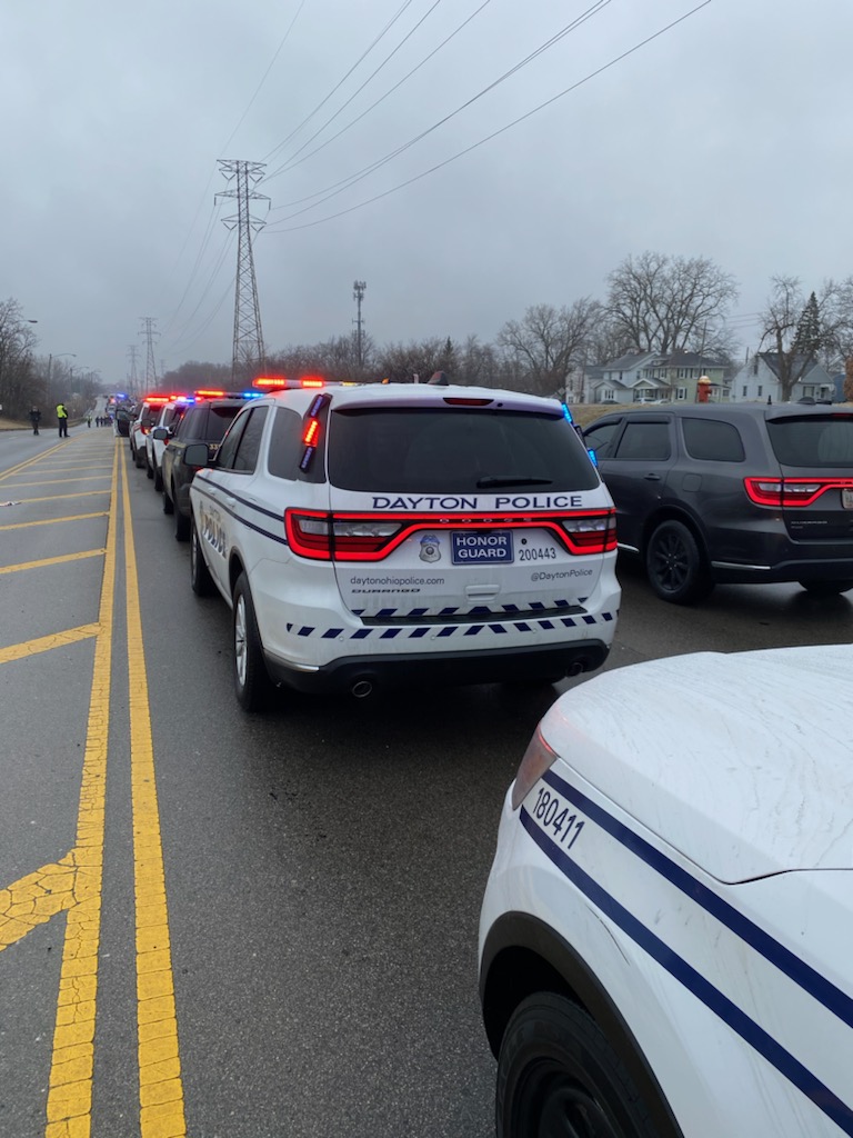 DaytonPolice's tweet photo. Ten police cruisers &amp; nearly two dozen of our officers traveled to #Toledo today to pay their respects &amp; honor fallen @ToledoPolice Officer Brandon Stalker as he is remembered and laid to rest. 
Our thoughts are with Off. Stalker's family, friends, and fellow officers. https://t.co/kMbAej5DJw