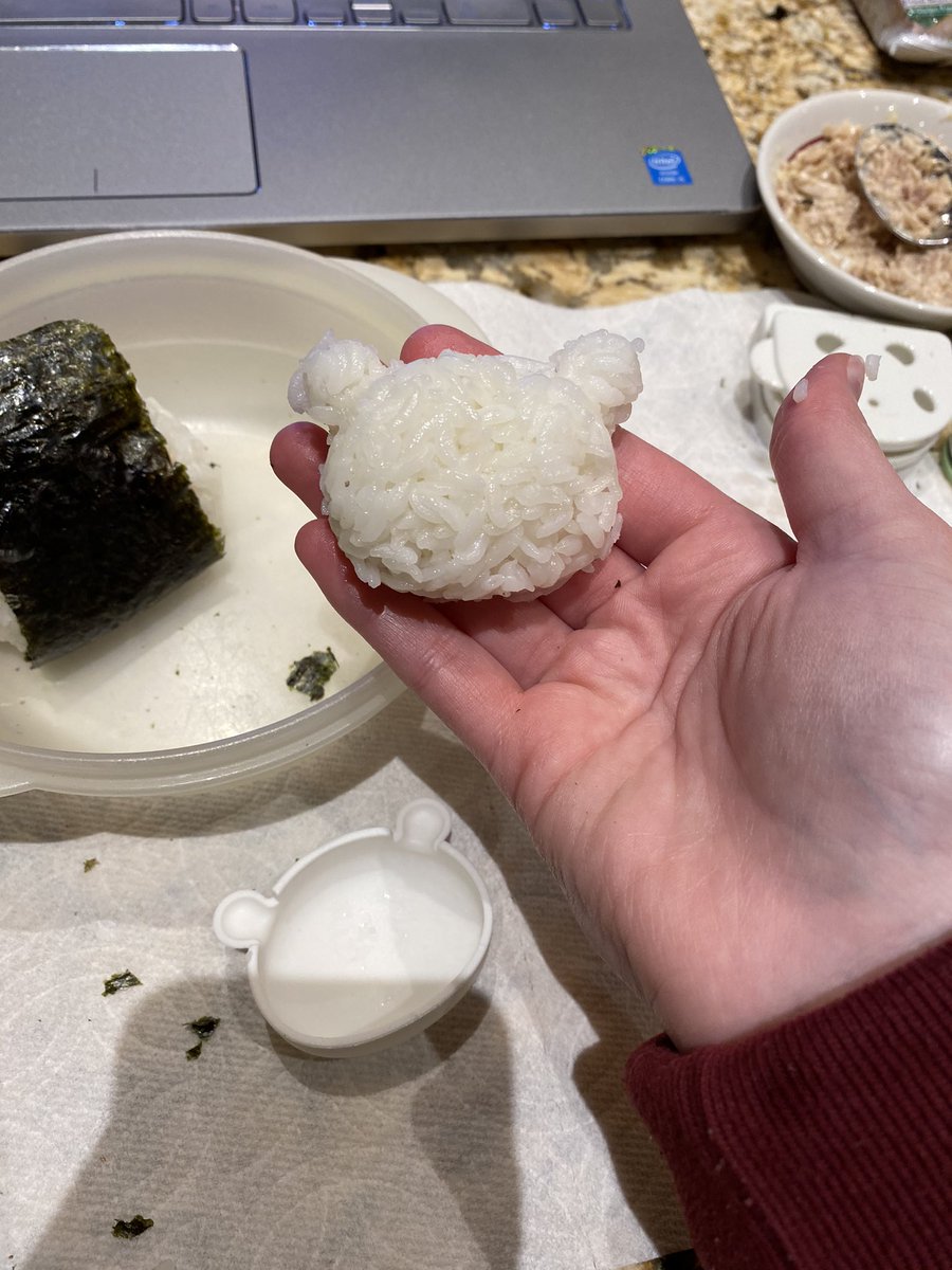 DunnettKaylin's tweet photo. We made a panda-shaped onigiri with a rice press and nori (seaweed). These types of decorative rice balls are common in Japanese bento, or lunch boxes. #OnigiriAction https://t.co/P7sLZZZhRI