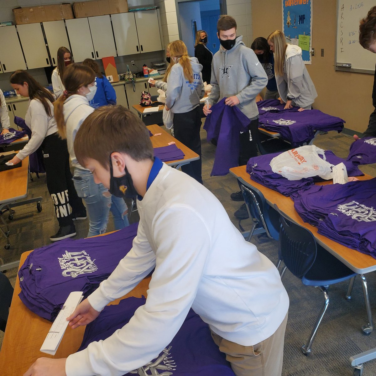 NHS students taking the lead on sorting shirts for their annual Purple Out fight against cancer #NFmustangscare #pride4NF <a href="/NFMustangs/">N-F Schools</a> #newewellfonda