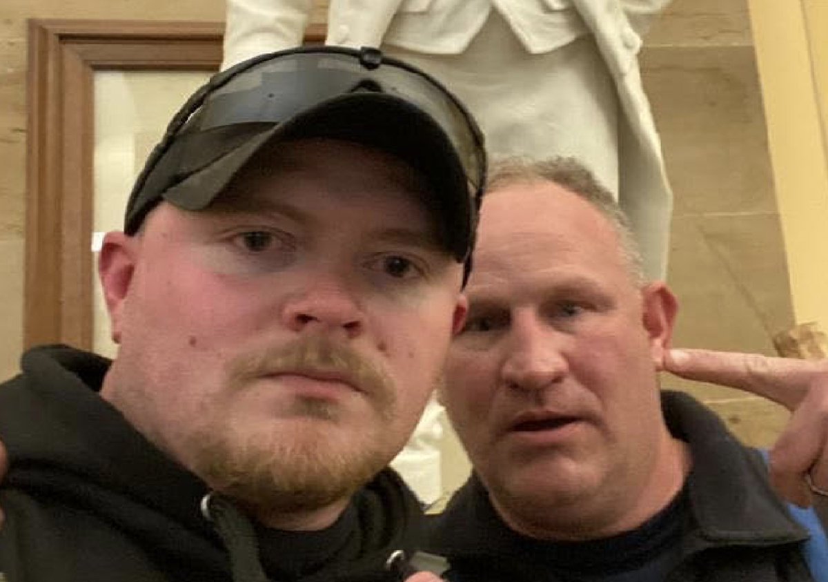 ajplus's tweet photo. 2 Virginia police officers who took photos of themselves inside the Capitol during the riot attack have been fired.

One is also in the National Guard. They both face federal charges and are among at least 31 police linked to the riot, reports @AP, but many still have their jobs. https://t.co/flCdssDiSO