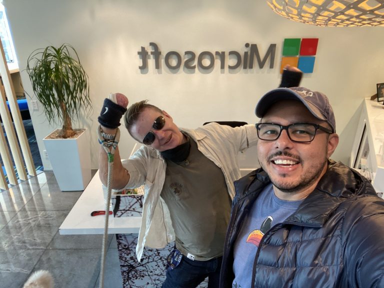 Humphrey, Whisky and Microsoft Azure Architect, Caio Tkalec taking a tour of the Wellington Microsoft Office.