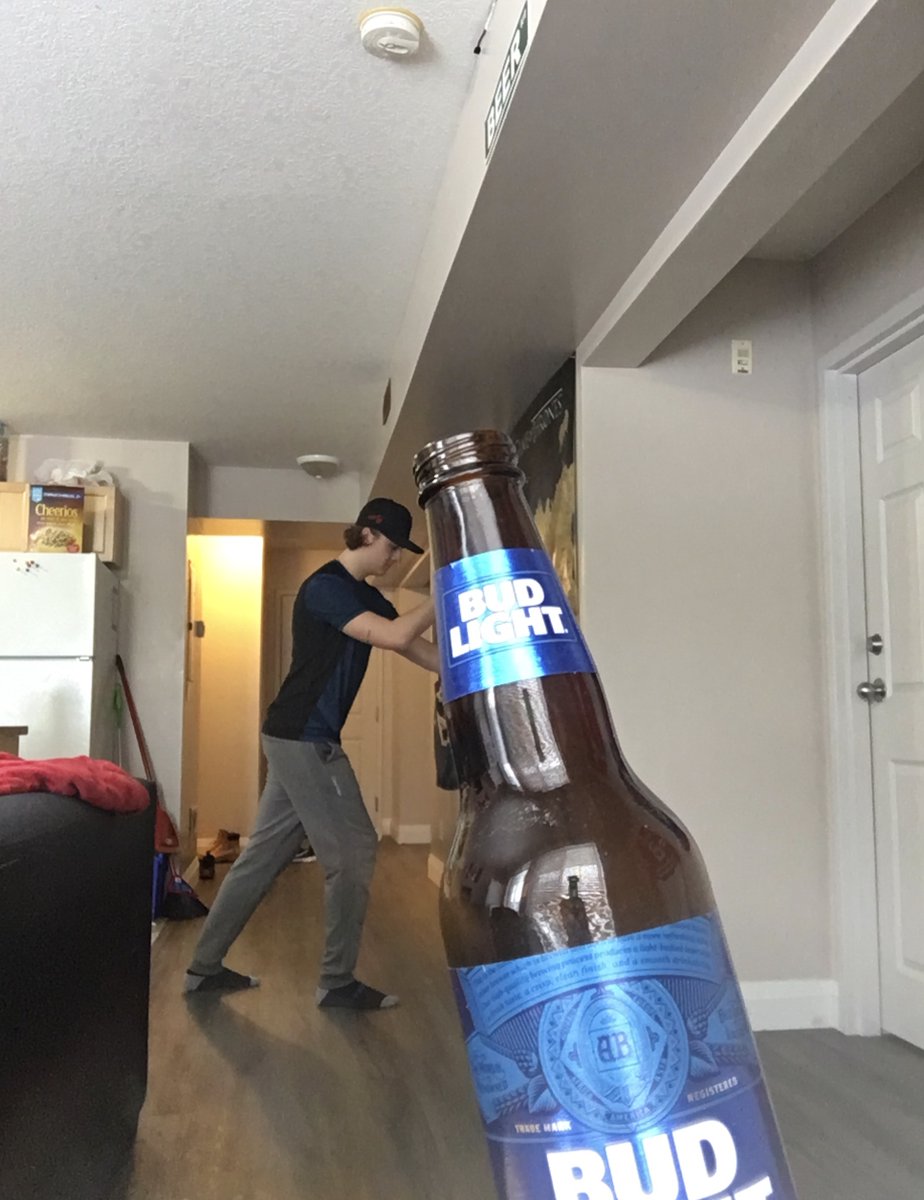 #PerceptionScavengerHunt <a href="/DrElizabethOlds/">Dr. Elizabeth Olds</a> This is a picture representing a size illusion and how one can perceive a beer bottle to be as big or bigger than a human