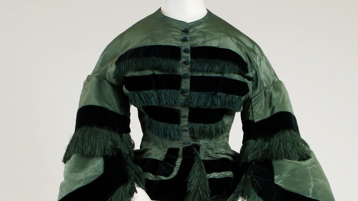 By the middle of the 19th century, it was the norm for women's bodices to fasten with buttons in front, and to do so with the buttons on the wearer's left.