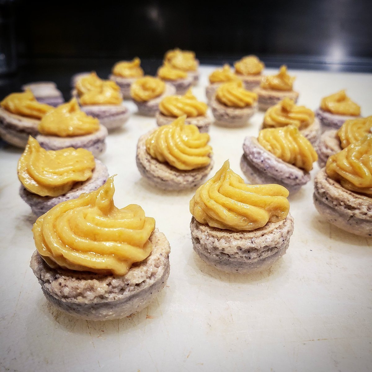 Hibiscus macaron shells with strawberry lime curd.

#offmenu #notsotruenorth #macaronshells #macarons #almondflour #bakingday #consumehappiness #yycdessert #yyceats #localyyc