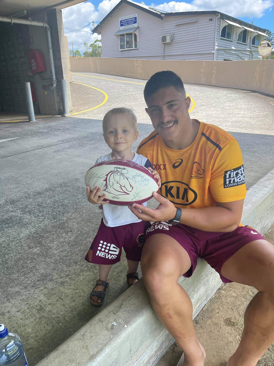 Kotoni Staggs went and got a footy and got all the team to sign it.Nate hasn’t let go of that football yet.