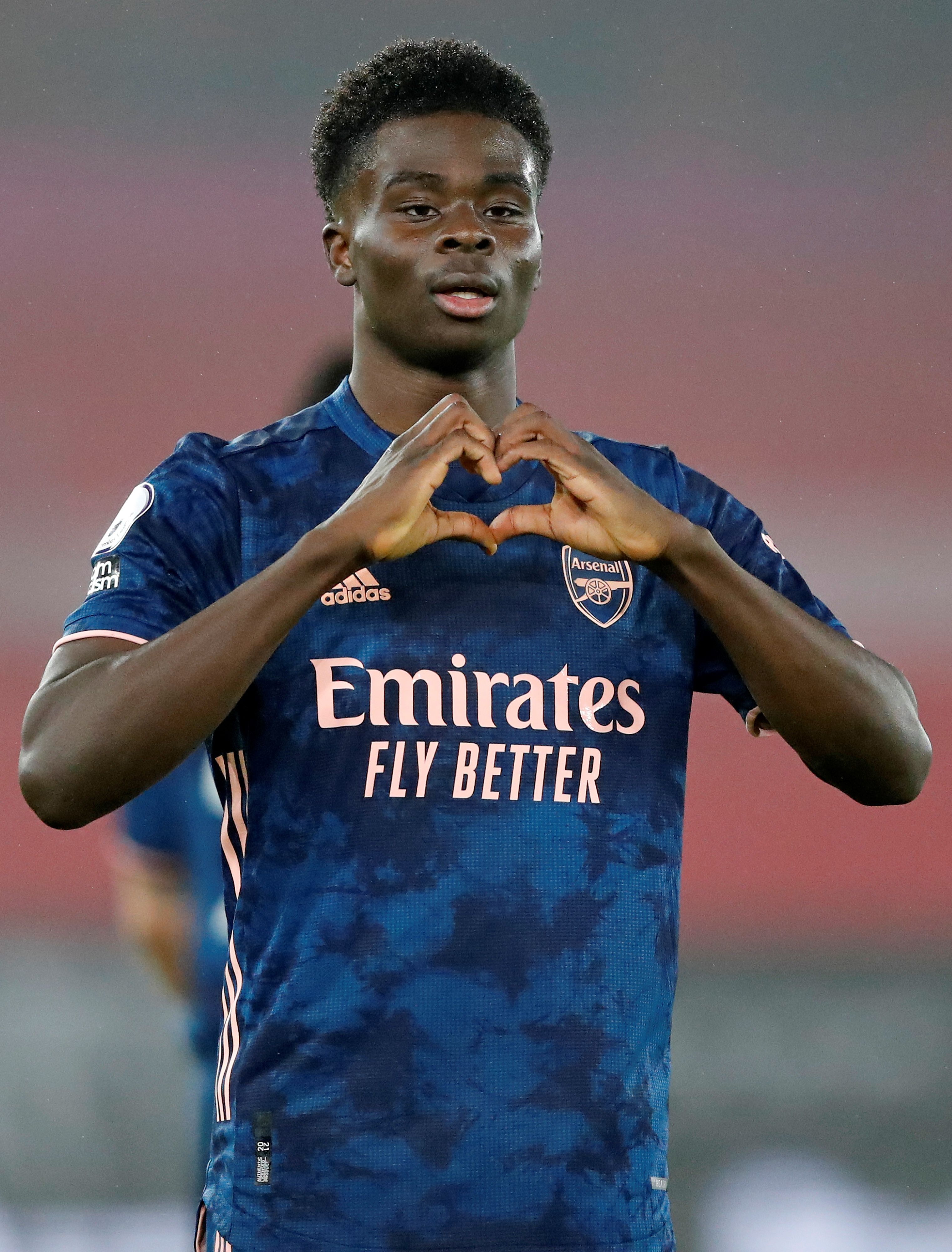 Saka makes a heart symbol