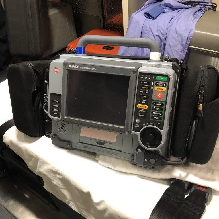 The monitor/defibrillator allows medics to review the heart rhythm (EKG), oxygen saturation, end tidal carbon dioxide (a measure of metabolism & perfusion), as well as deliver shocks if needed.I also use this data extensively for post-OHCA review.