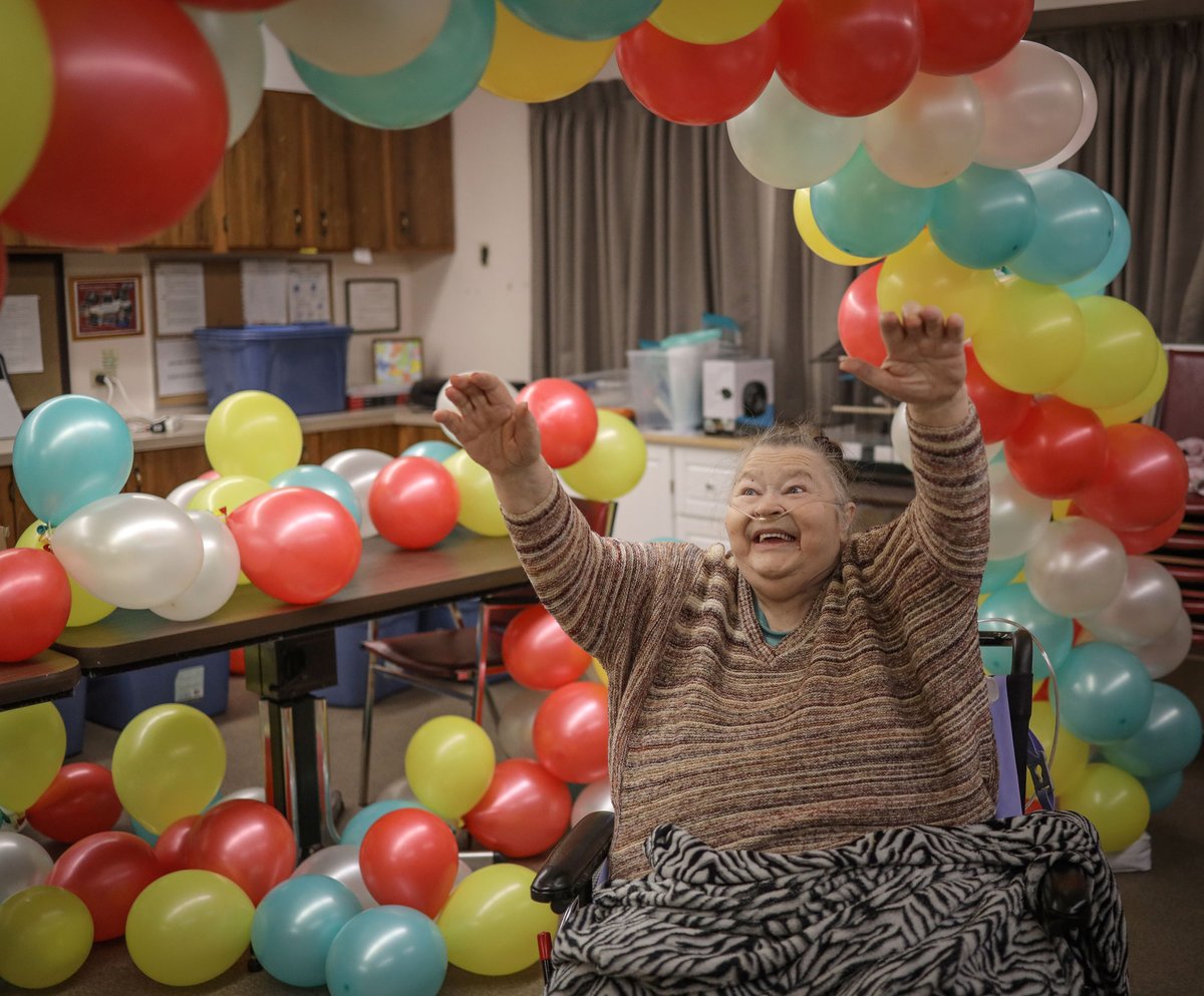 AHS_media's tweet photo. Joyce Adams has reason to celebrate—the 78-year-old Clifton Manor resident received her second dose of the #CovidVaccine this week. She shared a moment of joy with RN Emile Enongene, Director of Nursing at the manor. #ShotofHope https://t.co/W9FsjdkNEs